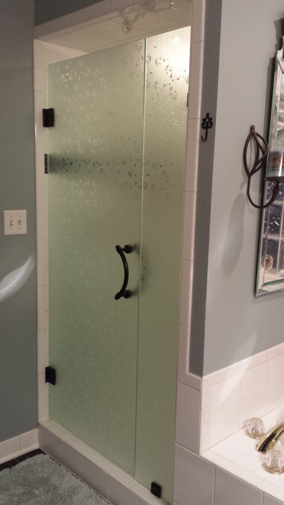 Frameless Door and Fixed Panel with Textured Glass